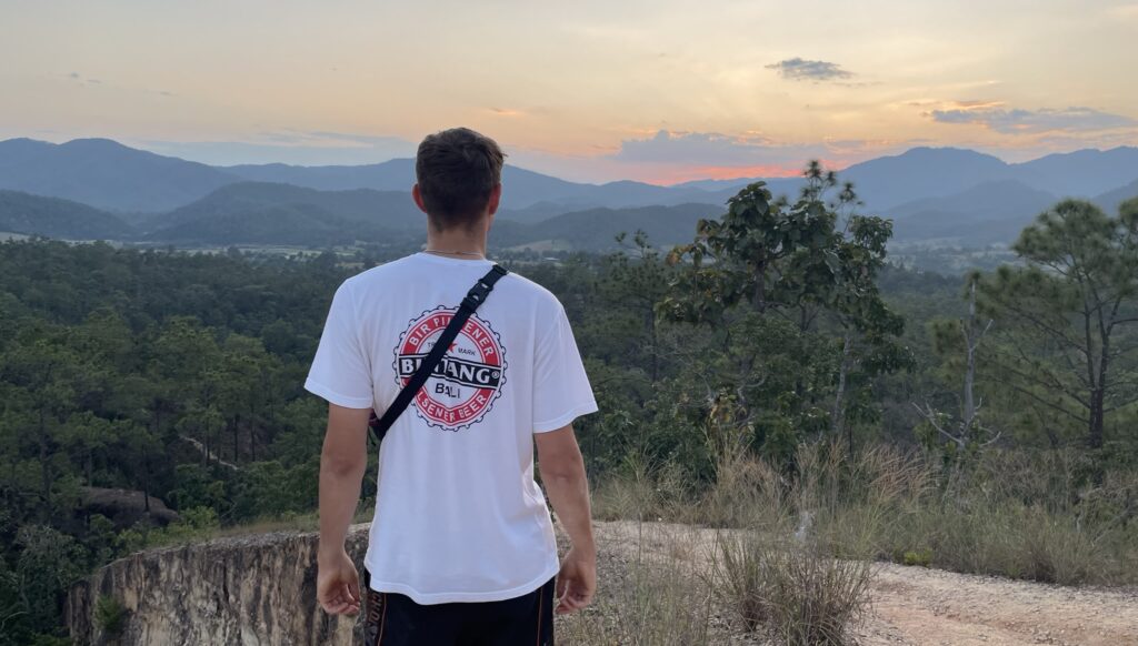 Man with Bali Bintang t-shirt at Pai Canyon, Thailand